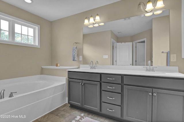 121 Poplar Branch Way, Hampstead, NC 28443 - bathroom featuring double vanity and a bath