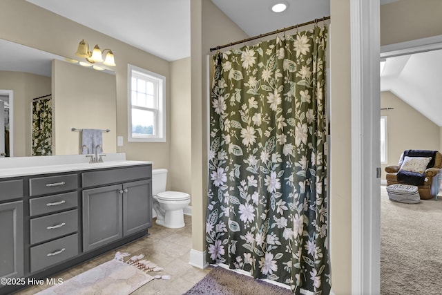 121 Poplar Branch Way, Hampstead, NC 28443 - bathroom featuring lofted ceiling, vanity, and curtained shower
