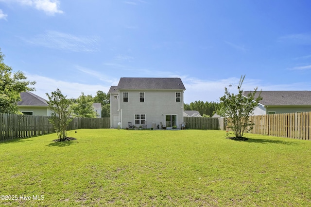 121 Poplar Branch Way, Hampstead, NC 28443 - rear view of property featuring a fenced backyard