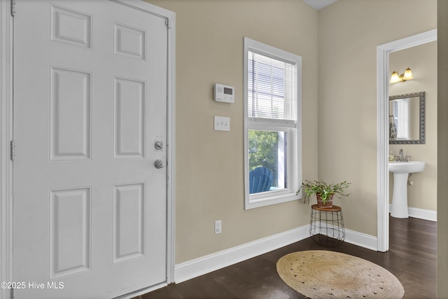 121 Poplar Branch Way, Hampstead, NC 28443 - foyer entrance with baseboards and dark wood-style flooring