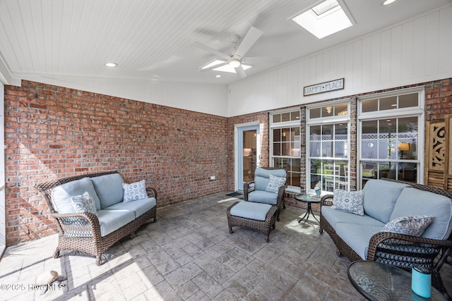 812 Vineyard Dr, New Bern, NC 28562 - sunroom featuring an outdoor living space, a ceiling fan, lofted ceiling, and a skylight
