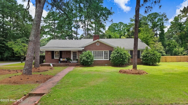 1714 E Walnut St, Goldsboro, NC 27530 - ranch-style house featuring brick siding, a chimney, covered porch, and a shingled roof