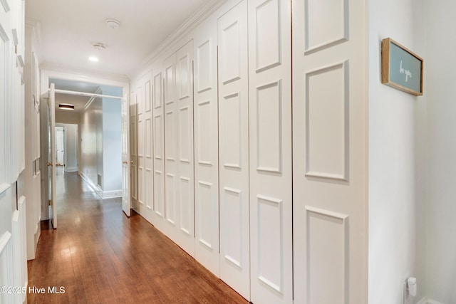 1714 E Walnut St, Goldsboro, NC 27530 - corridor featuring dark wood-type flooring, ornamental molding, and recessed lighting