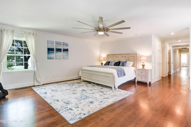 1714 E Walnut St, Goldsboro, NC 27530 - bedroom with wood finished floors, crown molding, a ceiling fan, and recessed lighting