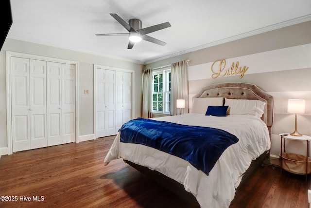 1714 E Walnut St, Goldsboro, NC 27530 - bedroom with multiple closets, crown molding, wood finished floors, and a ceiling fan