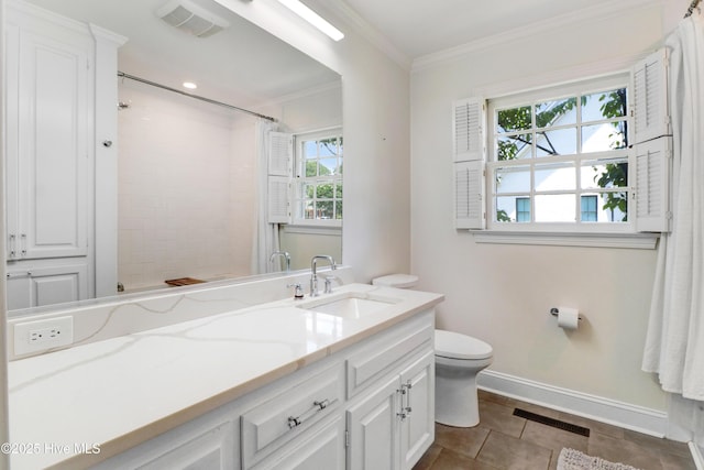 1714 E Walnut St, Goldsboro, NC 27530 - full bath featuring vanity, a tile shower, ornamental molding, and tile patterned flooring