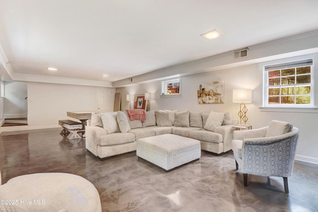 1714 E Walnut St, Goldsboro, NC 27530 - living area featuring concrete floors, recessed lighting, and crown molding