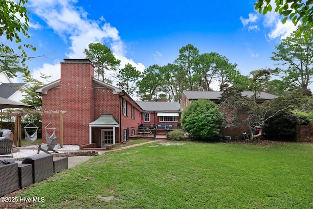 1714 E Walnut St, Goldsboro, NC 27530 - view of green lawn with a deck
