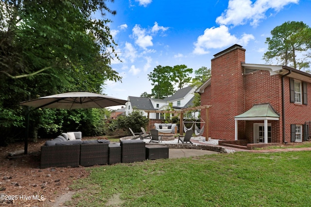 1714 E Walnut St, Goldsboro, NC 27530 - view of green lawn featuring an outdoor hangout area, a pergola, and a patio