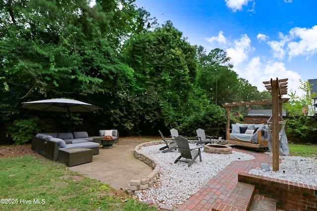 1714 E Walnut St, Goldsboro, NC 27530 - view of patio featuring an outdoor living space with a fire pit