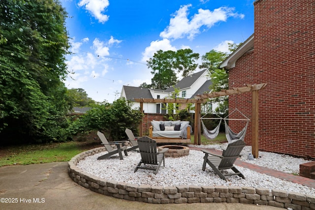 1714 E Walnut St, Goldsboro, NC 27530 - view of patio / terrace featuring a fire pit and a pergola