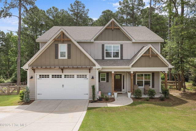 28 Winding Trl, Whispering Pines, NC 28327 - view of front of house featuring board and batten siding, concrete driveway, roof with shingles, and an attached garage