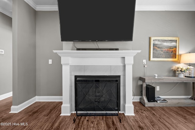 28 Winding Trl, Whispering Pines, NC 28327 - detailed view of wood finished floors, ornamental molding, and a tiled fireplace