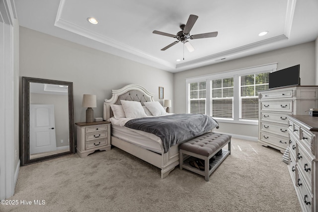 28 Winding Trl, Whispering Pines, NC 28327 - bedroom featuring a tray ceiling, recessed lighting, light carpet, crown molding, and a ceiling fan