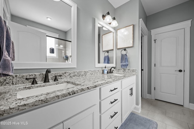 28 Winding Trl, Whispering Pines, NC 28327 - bathroom with double vanity and a shower with door