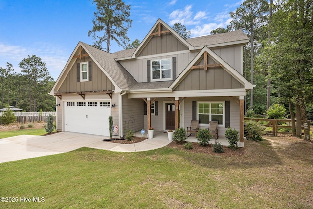 28 Winding Trl, Whispering Pines, NC 28327 - craftsman house with board and batten siding, a garage, driveway, roof with shingles, and a porch