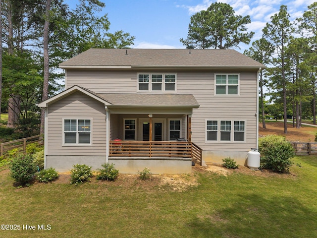28 Winding Trl, Whispering Pines, NC 28327 - rear view of house featuring covered porch