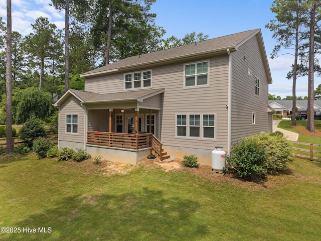 28 Winding Trl, Whispering Pines, NC 28327 - rear view of property with a porch
