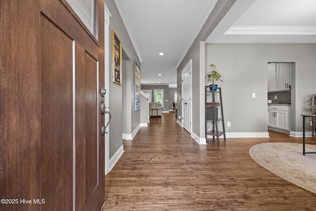 28 Winding Trl, Whispering Pines, NC 28327 - foyer featuring ornamental molding, dark wood finished floors, and recessed lighting