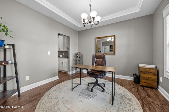 28 Winding Trl, Whispering Pines, NC 28327 - office area featuring a chandelier, a tray ceiling, dark wood-type flooring, and ornamental molding