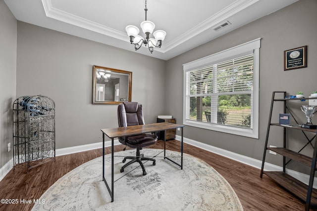 28 Winding Trl, Whispering Pines, NC 28327 - home office with a chandelier, ornamental molding, wood finished floors, and a tray ceiling