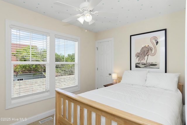 110 Mangrove Blvd, Emerald Isle, NC 28594 - bedroom with multiple windows and a ceiling fan
