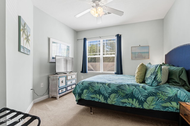 235 Woodlands Way Unit 9, Calabash, NC 28467 - bedroom with light colored carpet and ceiling fan