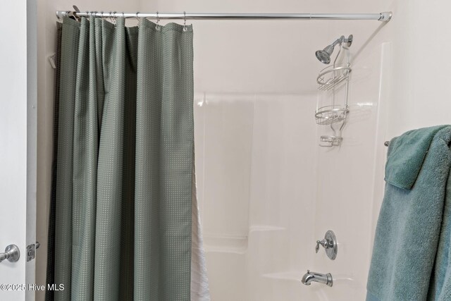235 Woodlands Way Unit 9, Calabash, NC 28467 - full bathroom featuring shower / tub combo with curtain