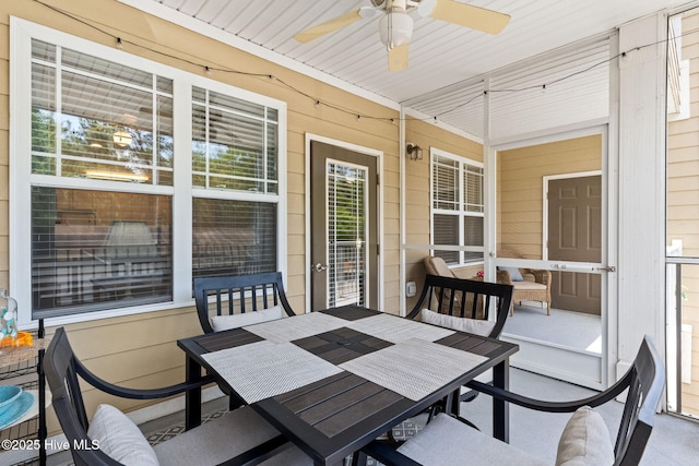 235 Woodlands Way Unit 9, Calabash, NC 28467 - sunroom with outdoor dining area and ceiling fan