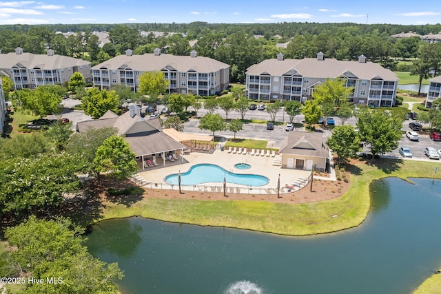 235 Woodlands Way Unit 9, Calabash, NC 28467 - drone / aerial view of a pool area and a large body of water