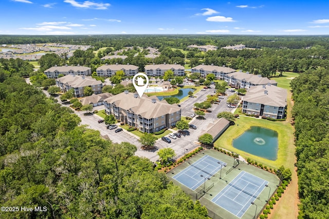 235 Woodlands Way Unit 9, Calabash, NC 28467 - drone / aerial view of a nearby body of water and apartment complex / building