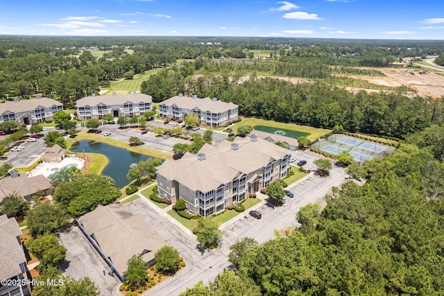 235 Woodlands Way Unit 9, Calabash, NC 28467 - bird's eye view of a nearby body of water and apartment complex / building