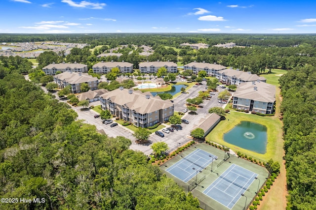 235 Woodlands Way Unit 9, Calabash, NC 28467 - bird's eye view of a large body of water and apartment complex / building