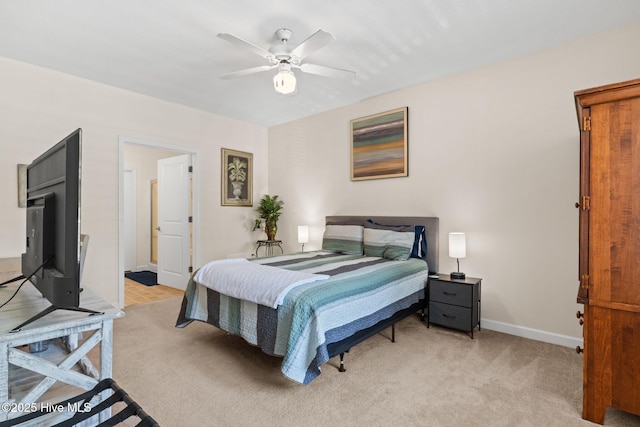 235 Woodlands Way Unit 9, Calabash, NC 28467 - bedroom with light carpet and ceiling fan