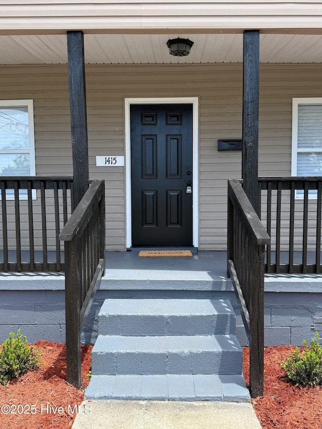 1415 Glenn St, Wilmington, NC 28401 - property entrance with a porch