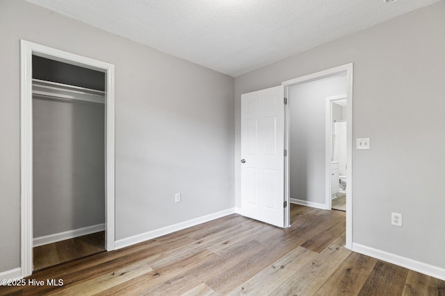 1415 Glenn St, Wilmington, NC 28401 - unfurnished bedroom featuring wood finished floors and a closet