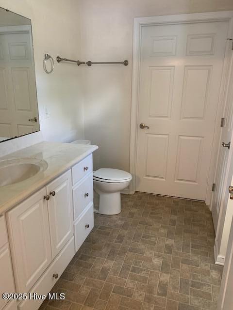 208 Canterwood Ln, New Bern, NC 28562 - bathroom featuring vanity and brick patterned flooring