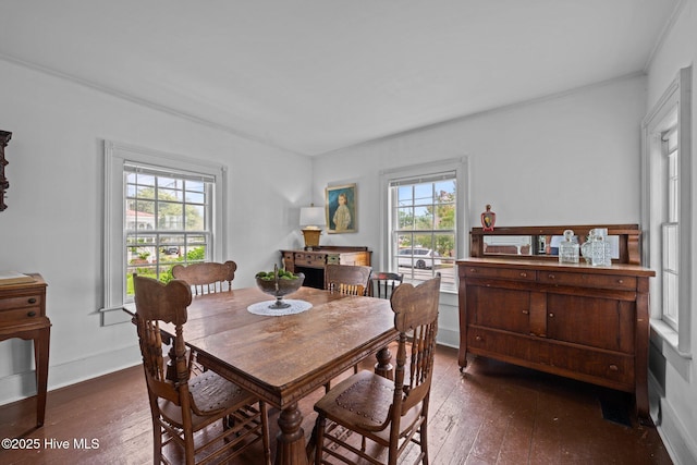 409 Hancock St, New Bern, NC 28560 - dining space with hardwood / wood-style flooring and crown molding