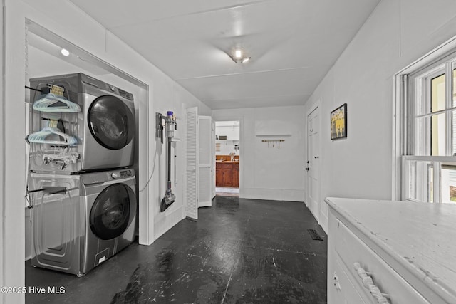 409 Hancock St, New Bern, NC 28560 - laundry area featuring stacked washing machine and dryer