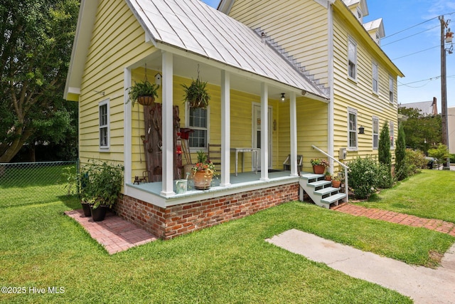 409 Hancock St, New Bern, NC 28560 - view of front of home with a porch, a metal roof, and a standing seam roof