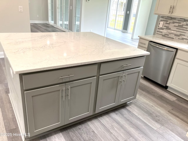 407 King Richard Ct, Jacksonville, NC 28546 - kitchen featuring dishwasher, gray cabinets, a center island, and light wood-type flooring