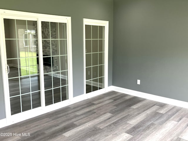 407 King Richard Ct, Jacksonville, NC 28546 - empty room with wood finished floors and baseboards