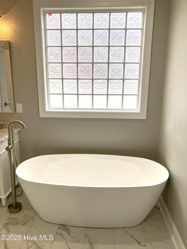 407 King Richard Ct, Jacksonville, NC 28546 - full bathroom featuring marble finish flooring and a freestanding tub