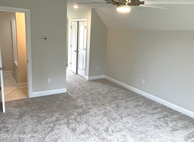 407 King Richard Ct, Jacksonville, NC 28546 - unfurnished bedroom with carpet floors, a closet, a ceiling fan, and vaulted ceiling