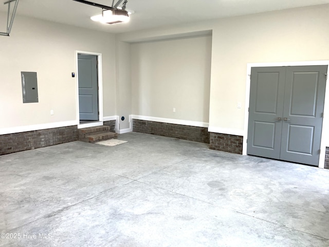407 King Richard Ct, Jacksonville, NC 28546 - garage featuring electric panel and a garage door opener