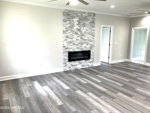 407 King Richard Ct, Jacksonville, NC 28546 - unfurnished living room featuring ceiling fan, wood finished floors, a large fireplace, ornamental molding, and recessed lighting