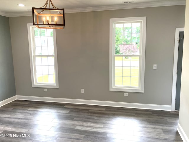 407 King Richard Ct, Jacksonville, NC 28546 - unfurnished dining area with dark wood-style floors, ornamental molding, a chandelier, and recessed lighting