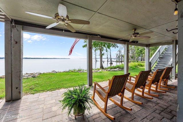 938 E Bayside Dr, Chocowinity, NC 27817 - view of patio / terrace featuring ceiling fan, a water view, and stairway