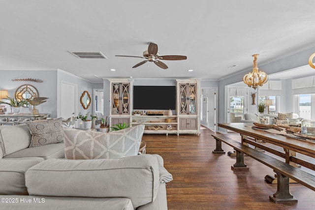 938 E Bayside Dr, Chocowinity, NC 27817 - living area with ornamental molding, ceiling fan, dark wood-style floors, recessed lighting, and a chandelier