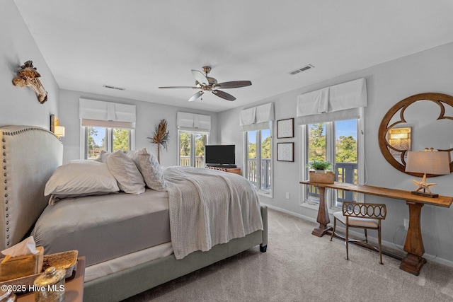 938 E Bayside Dr, Chocowinity, NC 27817 - bedroom featuring access to exterior, carpet, and ceiling fan
